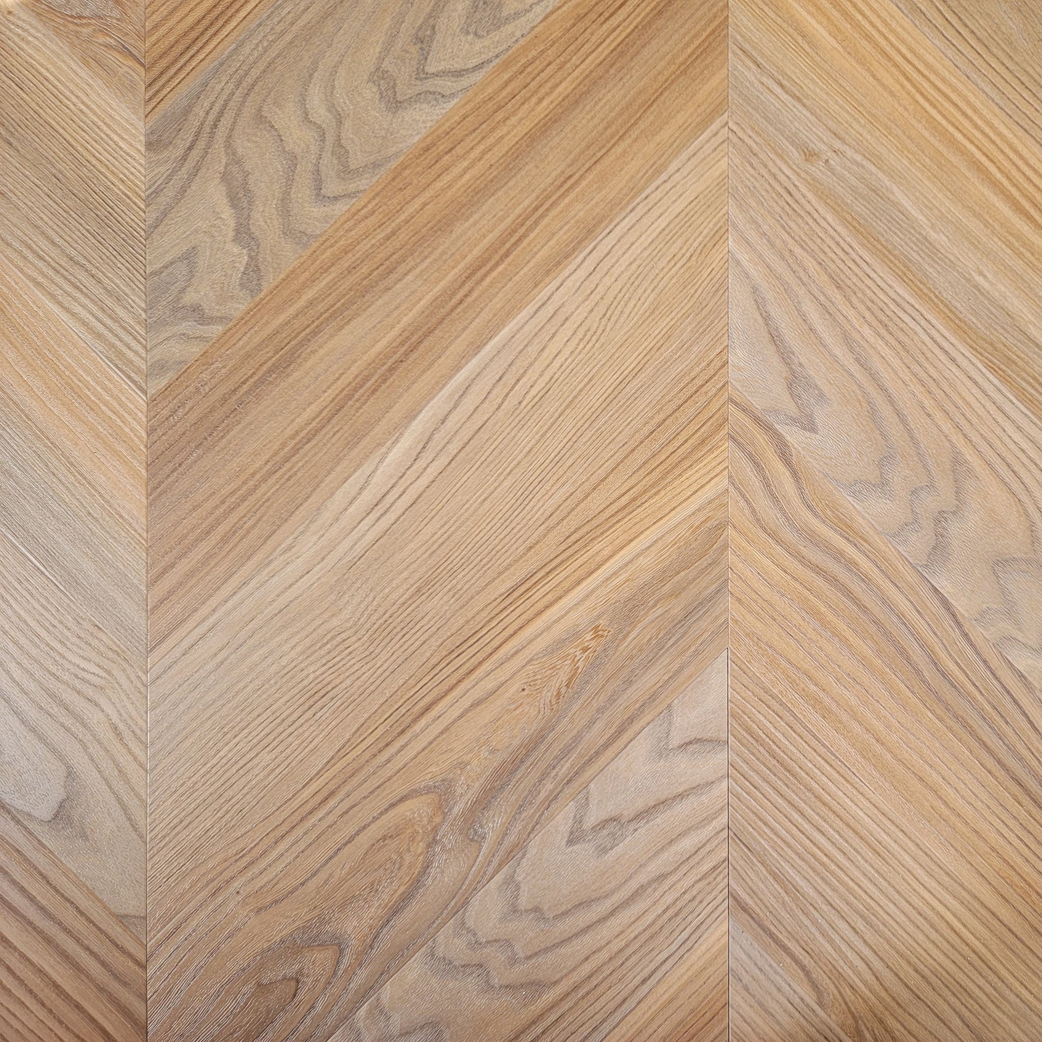 Chevron SPC flooring V-shaped pattern close-up detail