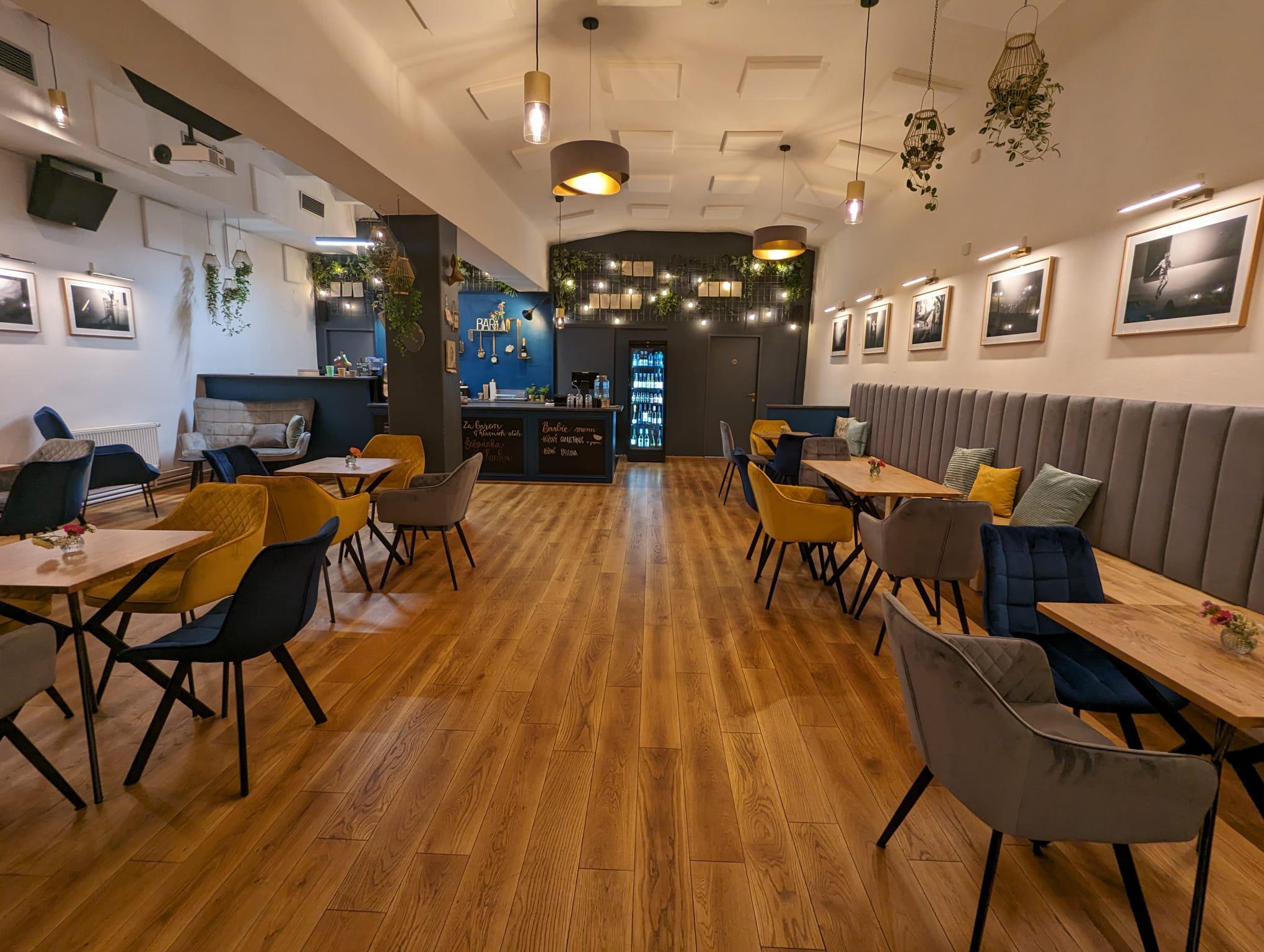Modern restaurant interior featuring waterproof MSPC flooring with natural wood appearance for commercial dining spaces.2.jpg